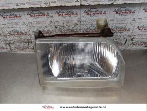 O170576 Gebruikte koplamp rechts Ford Escort