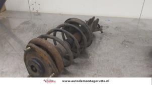 O170828 Gebruikte mac phersonpoot links-voor Mitsubishi Space Star