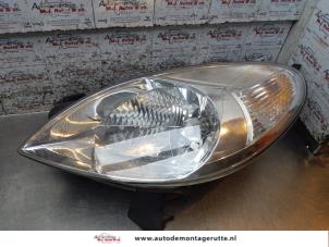 O170885 Gebruikte linker koplamp Citroen Picasso