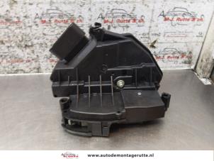O170899 Gebruikte deurslot mechaniek 4deurs links-achter Ford Focus