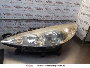 O170906 Gebruikte linker koplamp Peugeot 207