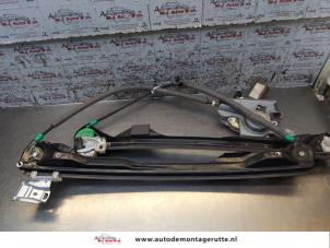 O170926 Gebruikte ruitmechaniek 4deurs links-voor Ford Focus