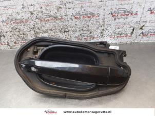 O170977 Gebruikte portiergreep 4deurs links-achter BMW 5-Serie