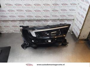 O171014 Gebruikte rechter koplamp Opel Mokka