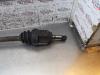 Gebruikte Aandrijfas links-voor Fiat Doblo O171020