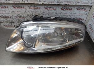 O171053 Gebruikte koplamp links Alfa Romeo GT