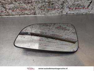 O171095 Gebruikte spiegelglas links Opel Astra