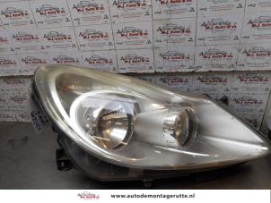 O171111 Gebruikte rechter koplamp Opel Corsa