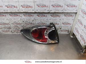 O171143 Gebruikte achterlicht links Mazda 6.
