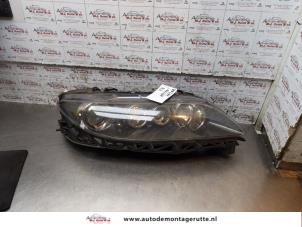 O171153 Gebruikte koplamp rechts Mazda 6.