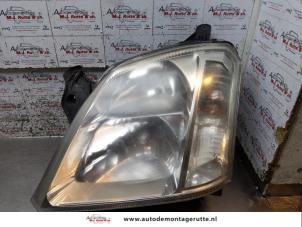 O171191 Gebruikte linker koplamp Opel Meriva