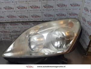 O171225 Gebruikte koplamp links Opel Zafira