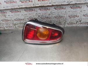 O171310 Gebruikte achterlicht links BMW Mini One