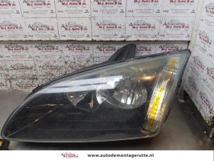 O171479 Gebruikte koplamp links Ford Focus