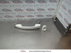 O171630 Gebruikte portiergreep 2deurs links Ford KA