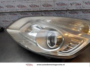 O171669 Gebruikte linker koplamp Renault Grand Scenic