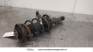 O171735 Gebruikte schokdemperpoot rechts-voor Volkswagen Fox