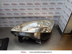 O172407 Gebruikte linker koplamp Peugeot Partner