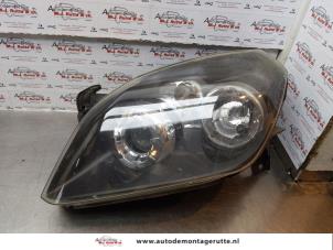 O172446 Gebruikte koplamp links Opel Tigra