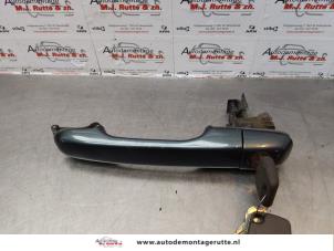 O172458 Gebruikte deurgreep 4deurs links-voor Volvo V70