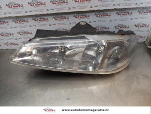 O172758 Gebruikte koplamp links Peugeot 406