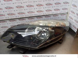 O172982 Gebruikte linker koplamp Renault Grand Scenic