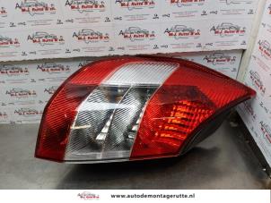 O172993 Gebruikte achterlicht links Renault Grand Scenic