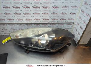 O173079 Gebruikte rechter koplamp Renault Grand Scenic