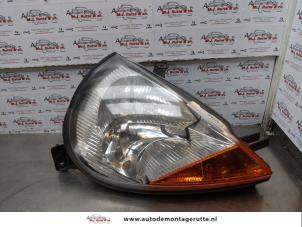 O173101 Gebruikte rechter koplamp Ford KA