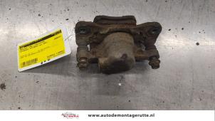 O173196 Gebruikte remklauw (tang) links-achter Mitsubishi Outlander