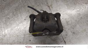 O173543 Gebruikte remklauw (tang) links-voor BMW 1-Serie