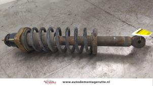 O173553 Gebruikte schokbrekerpoot links-achter Mitsubishi Outlander