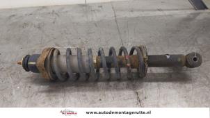 O173554 Gebruikte schokbrekerpoot recht-achter Mitsubishi Outlander