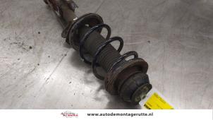 O173750 Gebruikte schokdemperpoot links-voor Nissan Pixo