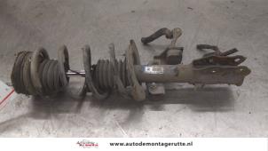 O173978 Gebruikte schokdemperpoot rechts-voor Mazda 2.
