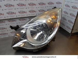 O173998 Gebruikte koplamp links Opel Agila