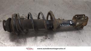 O174011 Gebruikte schokdemperpoot links-voor Nissan Pixo