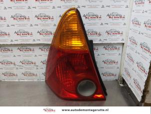 O174028 Gebruikte achterlicht links Daihatsu Young RV