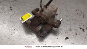 O174102 Gebruikte remklauw (tang) links-achter Mini Cooper