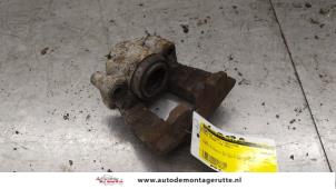 O174103 Gebruikte remklauw (tang) links-voor Mini Cooper