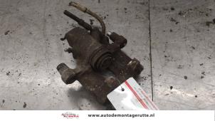 O174104 Gebruikte remklauw (tang) rechts-achter Mini Cooper