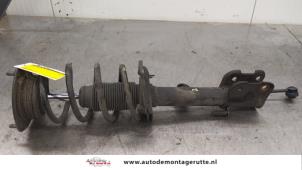 O174107 Gebruikte schokdemperpoot links-voor Hyundai Santafe