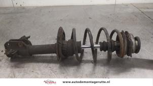 O174162 Gebruikte schokdemperpoot links-voor Fiat Punto