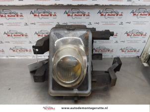 O174245 Gebruikte mistlamp links-voor Opel Zafira