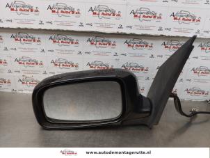 O174253 Gebruikte buitenspiegel links Daihatsu Sirion