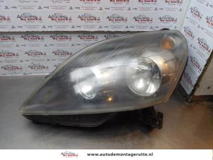 O174268 Gebruikte koplamp links Opel Zafira