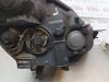 Gebruikte Koplamp links Opel Zafira O174268