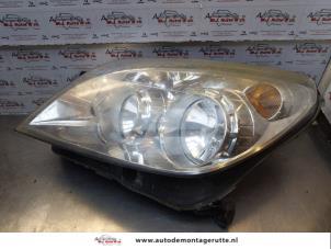 O174329 Gebruikte koplamp links Opel Astra