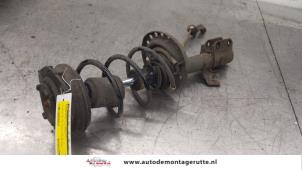 O174346 Gebruikte mac phersonpoot links-voor Nissan Micra