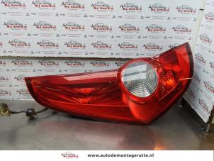 O174506 Gebruikte achterlicht links Opel Agila